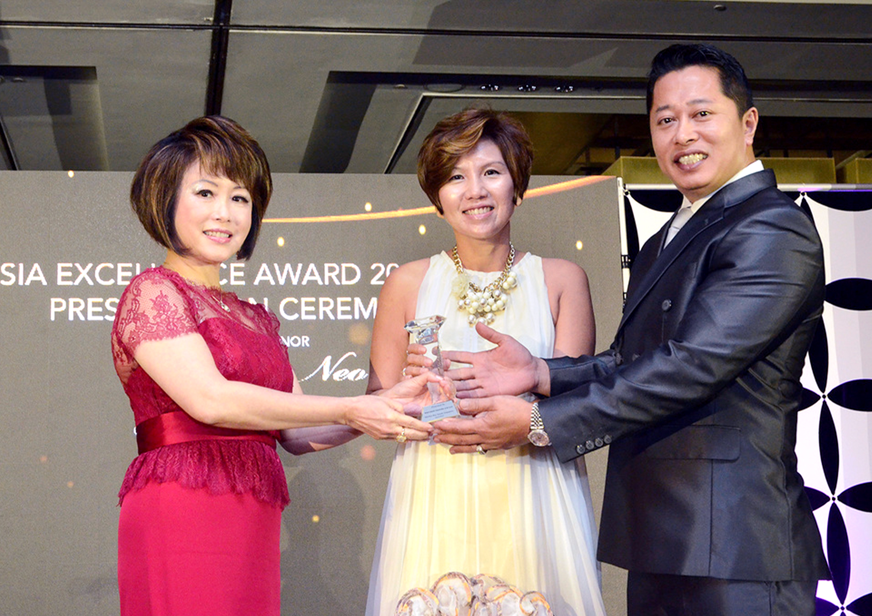 Asia Excellence Award presented by Member of Parliament Dr Lily Neo